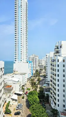 a view of a city with tall buildings and the ocean at El Laguito Cartagena - Apartamento 2 habitaciones acceso directo a playa in Cartagena de Indias