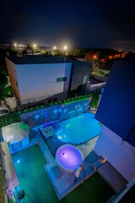 an overhead view of a swimming pool at night at Studio at the Resort Residence 2 in Puerto Colombia