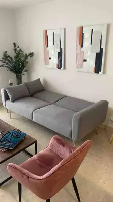 a living room with a couch and a chair at Vacation Home Apartment in Cartagena in Cartagena de Indias