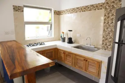 a kitchen with a sink and a window at Apartamento Villa Carolina 101 in San Antero