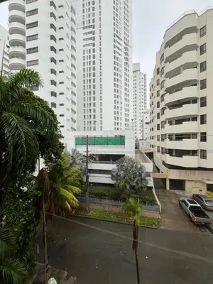 a street in a city with tall buildings at Antares Apartment in Cartagena de Indias