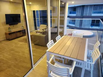 a room with a table and chairs and a living room at Dominique luxury 1410 Jacuzzi Privado in Cartagena de Indias