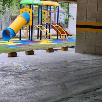 a playground with a slide in a parking lot at Dominique luxury 1410 Jacuzzi Privado in Cartagena de Indias