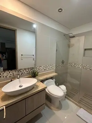 a bathroom with a sink and a toilet and a shower at Palmetto Sunset 3204 in Cartagena de Indias