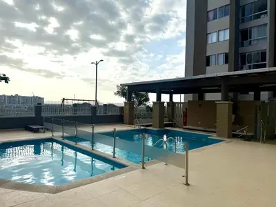 a large swimming pool on top of a building at Ciudad Mallorquin in Puerto Colombia