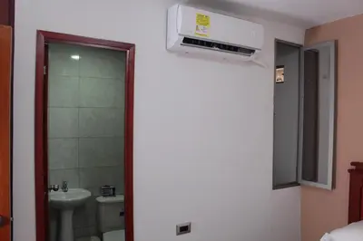 a bathroom with a toilet and a sink at Hospedaje san gabriel in Barranquilla