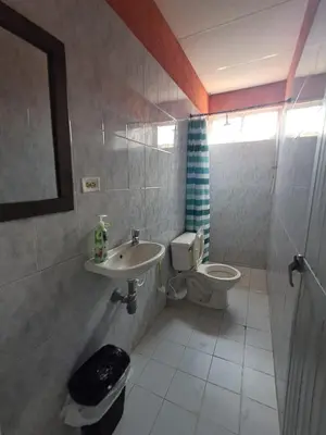 a bathroom with a sink and a toilet at LE REEVE, 3BR, Paz, Diseño Bohemio & Grupos in Cartagena de Indias