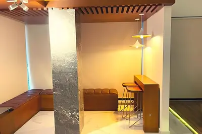 a living room with a couch and a table at Apartaestudios Calle 76 in Barranquilla