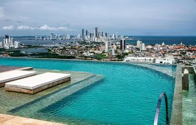 a swimming pool with a view of a city at Muranocentro1601 in Cartagena de Indias