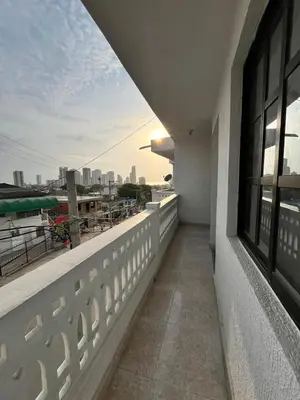 a balcony with a view of a city skyline at Hospedaje Las Palmas apto 203 in Cartagena de Indias