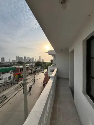 a balcony of a building with a view of a city at Hospedaje Las Palmas apto 203 in Cartagena de Indias