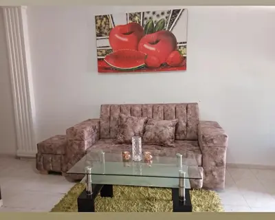 a living room with a couch and a glass table at Casa rosymar in Cartagena de Indias