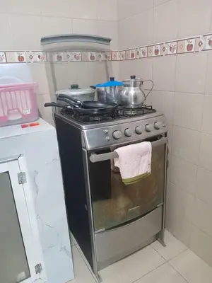 a kitchen with a stove with a pot on it at Casa rosymar in Cartagena de Indias