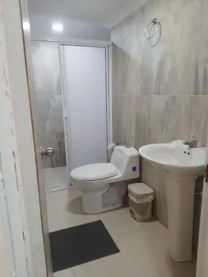 a bathroom with a toilet and a sink at Apto espectacular frente al mar in Cartagena de Indias