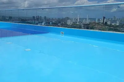 a swimming pool with a view of the city at Apartamento - Edf Acuarium - Torices in Cartagena de Indias