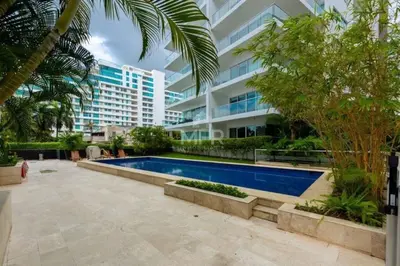 a swimming pool in front of a building at Morros Vitri Beachfront & 2 Bedrooms in Cartagena de Indias