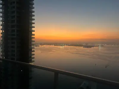 a view of the water at sunset from a building at Infinitum de lujo in Cartagena de Indias