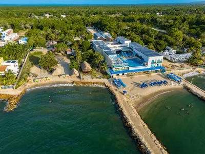 an aerial view of a resort on the beach at Ilukas & Resort Villas in Coveñas