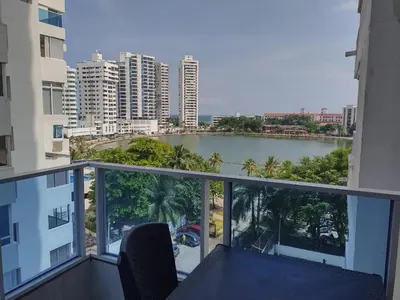 a balcony with a view of a river and buildings at Balcón del mar in Cartagena de Indias