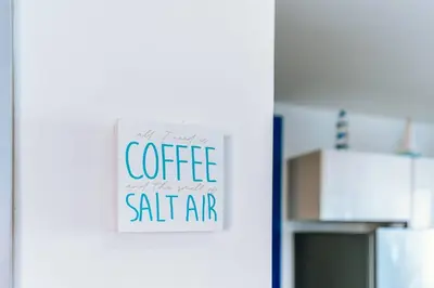 a sign on a door that reads coffee in a kitchen at Cartagena Paradise Beach Home Sleeps 7 in Cartagena de Indias