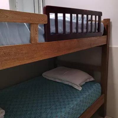a bunk bed with a pillow on the bottom bunk at Apartamento Cartagena Torices 50 in Cartagena de Indias