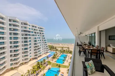 an apartment with a balcony with a view of the beach at Morros Epic - La Boquilla, Seaview & 2Bdr in Cartagena de Indias