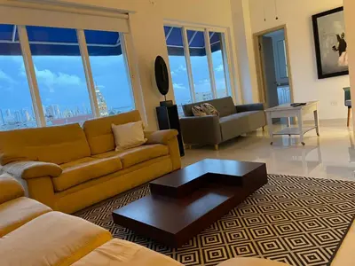 a living room with couches and a coffee table at HERMOSOS APARTAMENTOS EN La CIUDAD VIEJA in Cartagena de Indias