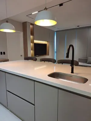 a kitchen with a sink and two lights at Lujoso apto con vista al mar en Morros Ultra in Cartagena de Indias
