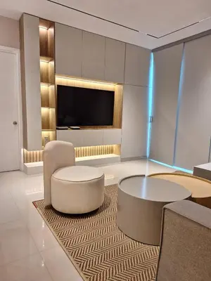 a living room with a couch and a table and a tv at Lujoso apto con vista al mar en Morros Ultra in Cartagena de Indias