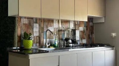 a kitchen with a sink and a counter top at A 5 mins de CC único King, Aire, Wi-Fi, Cocina in La Mina