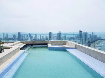 a swimming pool on the top of a building at Luxury Apartment - Stunning Sea View in Cartagena de Indias