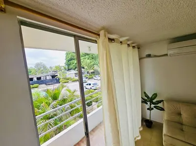 a room with a balcony with a sliding glass door at Apartamento Villa San Pedro in San Roque