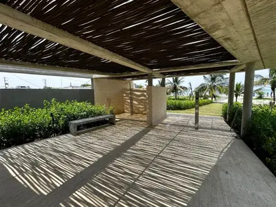 a covered walkway with a wooden roof at Lujo y relax frente al mar en Morros Eos in Cartagena de Indias