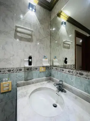 a bathroom with a white sink in a room at Private House - 4 Pisos - 100 Mts de la playa in Cartagena de Indias