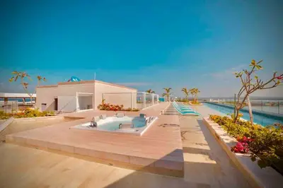 a resort with a pool and a hot tub at Martinique Apto Private Jacuzzi - Netflix-Disney-Prime in Cartagena de Indias