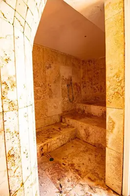 a dirty bathroom with a tub in a room at Caribbean Beachfront Getaway in Cartagena de Indias