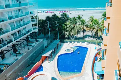 an aerial view of a resort with a swimming pool and the beach at Caribbean Beachfront Getaway in Cartagena de Indias