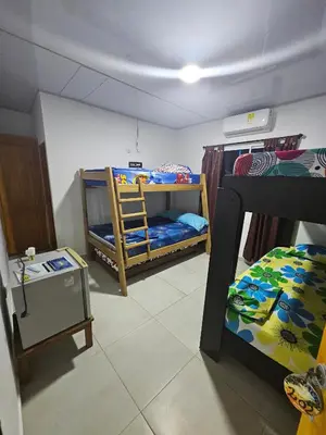 a room with two bunk beds in a room at Cabaña Sol y Mar 2 in Coveñas