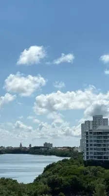 a large body of water with a building in the background at Apto playa Alojamiento en Cartagena in Cartagena de Indias