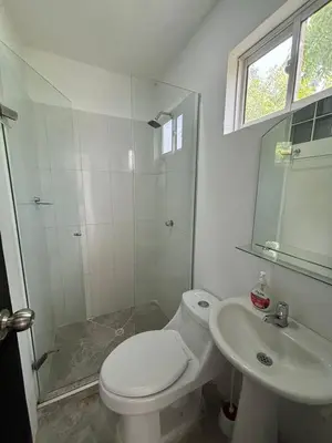 a bathroom with a toilet and a shower and a sink at Apartamento 2 habitaciones Paraiso, by Accommdo360 in Barranquilla