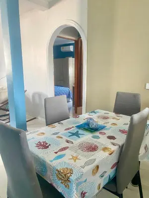a table with a patterned table cloth on top of it at Apartamento Acogedor en Cartagena in Cartagena de Indias