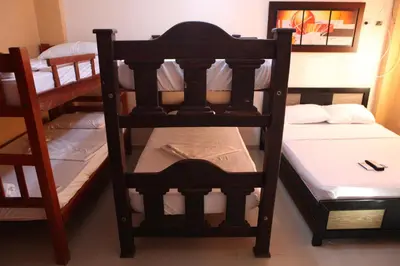 a room with a bunk bed and two bunk beds at Hotel Boquilla Suites By GEH Suites in Cartagena de Indias