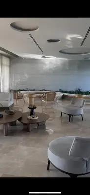 a room with tables and chairs in a room with a view at Apartamento en Cartagena in Cartagena de Indias