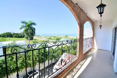 a balcony with a view of the ocean at Te la mereces, frente al mar in Cartagena de Indias