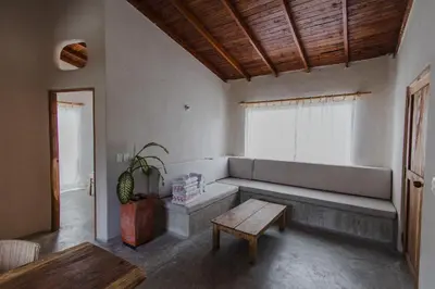 a living room with a couch and a table at Apartamento Atlantic 311 in La Perdiz