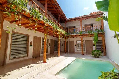 an image of a house with a swimming pool at CASA EMMA HOTEL Boutique in Cartagena de Indias