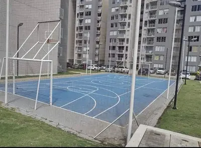 a basketball court in the middle of a city at Apartamento en alameda del Río Conjunto Azulejo in Barranquilla