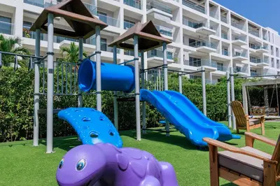 a playground in front of a large building at Exclusive Loft In Cartagena By Huepedia in Cartagena de Indias