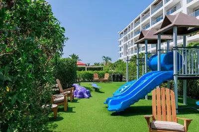 a playground with a blue slide in front of a building at Exclusive Loft In Cartagena By Huepedia in Cartagena de Indias