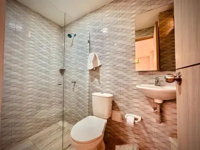 a bathroom with a toilet and a sink and a shower at Hotel La Estrella de David Cartagena in Cartagena de Indias